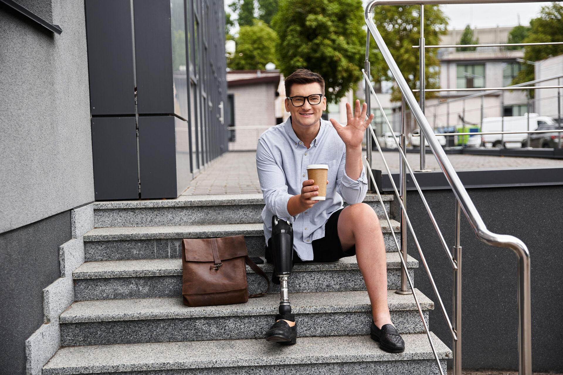 handsome-young-man-with-prosthetic-leg-sitting-on-2024-12-18-02-14-46-utc_2