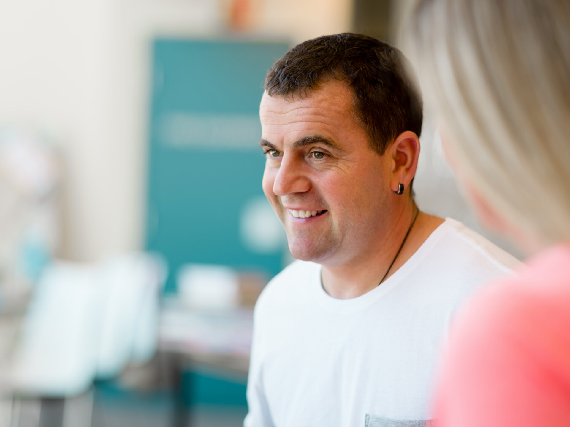Support worker assisting with self-care